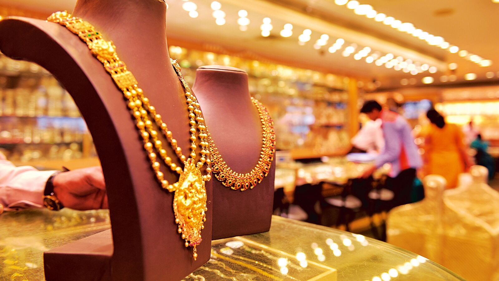 Gold price today: MCX gold rate dropped to its  <span class='webrupee'>₹</span>128,000 levels on Tuesday, 21 October 2025, during the second commodity market session of the day. 