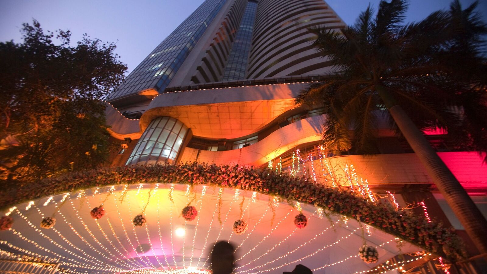 The Bombay Stock Exchange (BSE) building is illuminated during a special holiday trading session on the occasion of Diwali, the festival of light, in Mumbai, India, on Saturday, Oct. 17, 2009. Brokers and investors at the BSE made token stock purchases during a one-hour trading session on Diwali, the festival of light and the start of the Hindu new year. Photographer: Prashanth Vishwanathan/Bloomberg